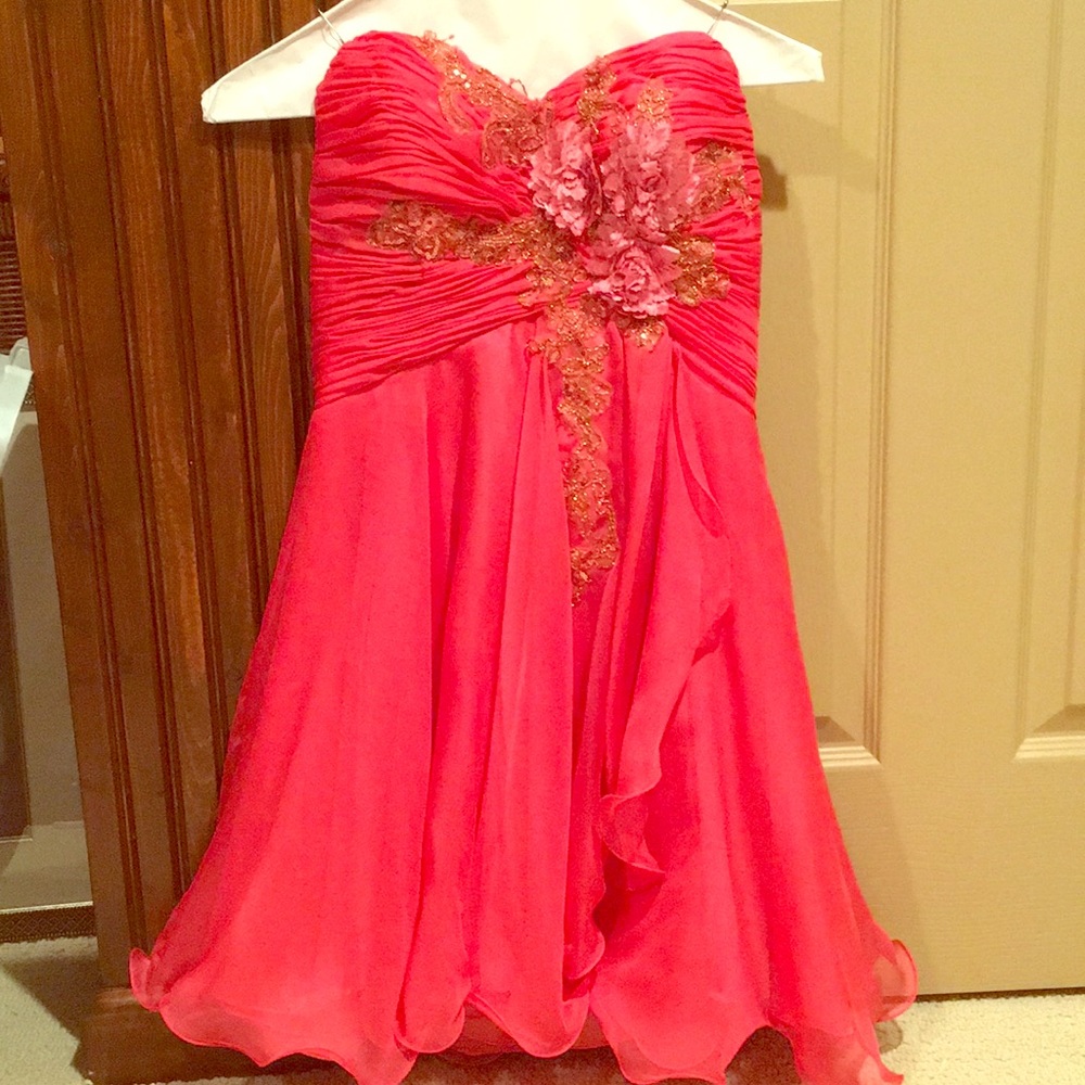 Women’s strapless, peach dress